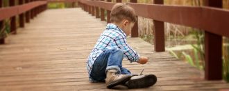 Child on a bridge