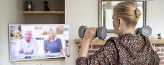 Elderly lady lifting weights