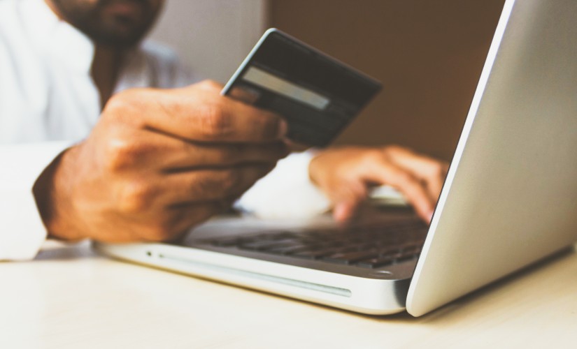 Person shopping for groceries on a laptop