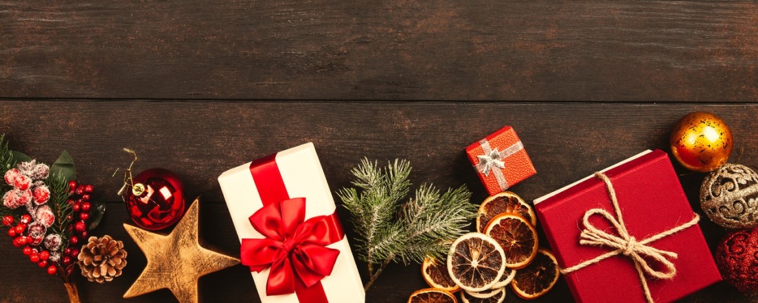 Christmas presents on wooden floor