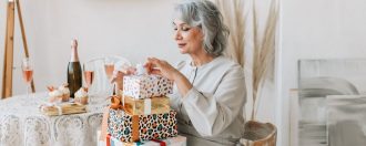 elderly woman receiving mother's day gifts