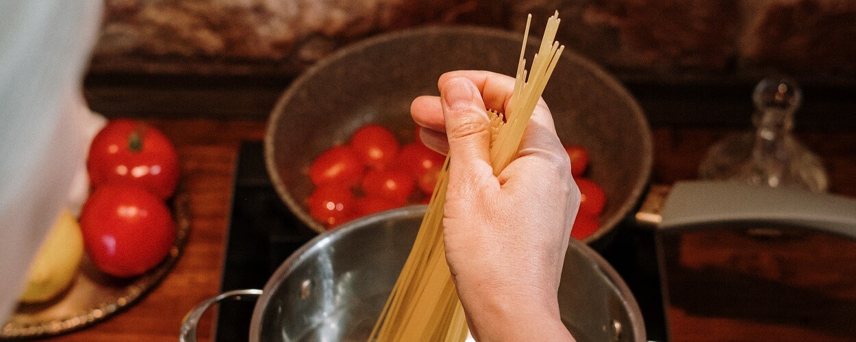 person cooking at home