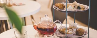 a spread of food and drink for afternoon tea