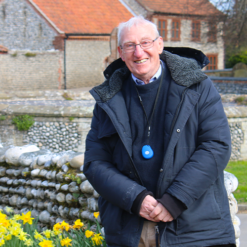 Elderly man wearing his Careline GPS Alarm